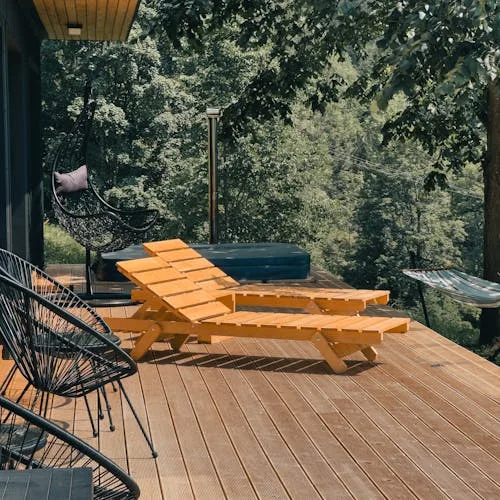 Outdoor wooden deck with lounge chairs