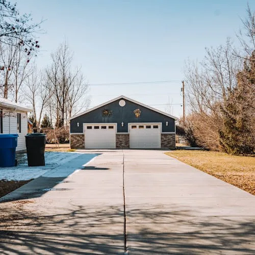Concrete driveway before pressure washing